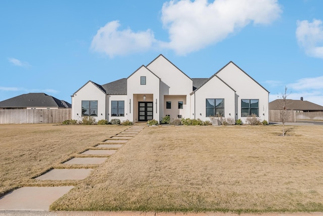 view of front of home with a front yard