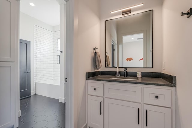 bathroom featuring tile patterned floors and vanity