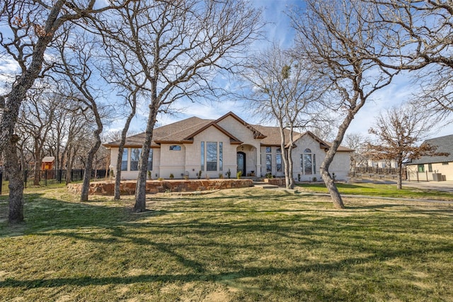 view of front of house with a front lawn