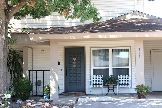 doorway to property featuring a porch