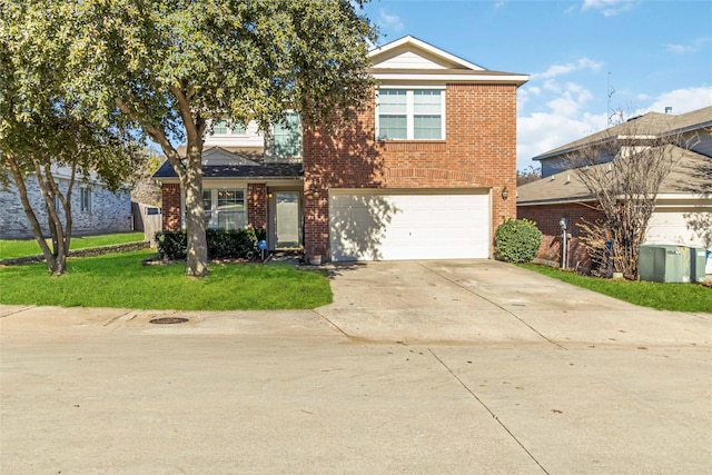 view of property with a front yard and a garage