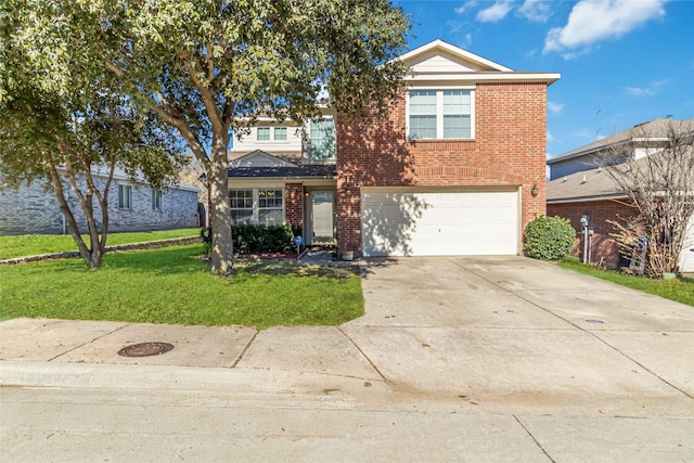 view of property featuring a front yard and a garage