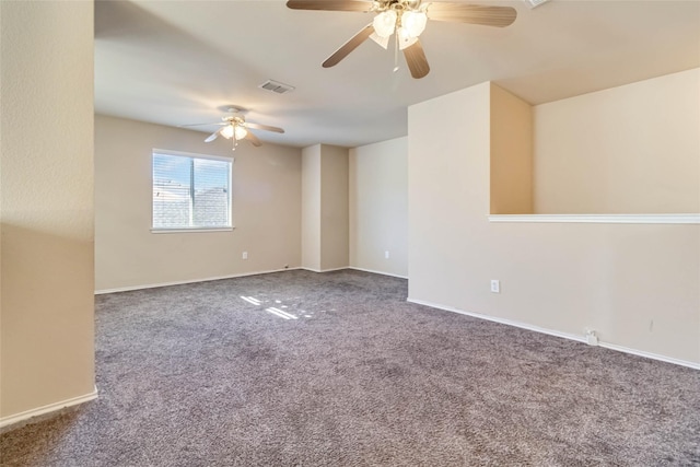 spare room with carpet floors and ceiling fan