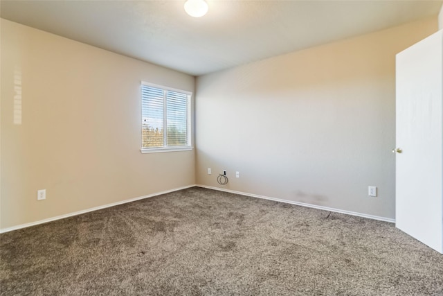 empty room with carpet flooring