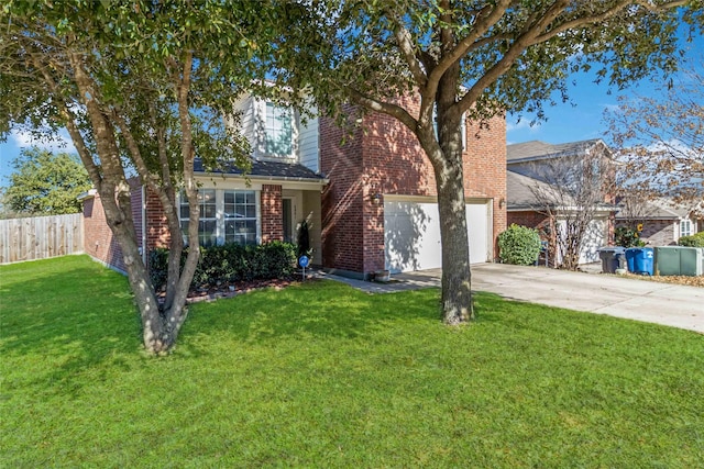 view of front of home featuring a front lawn and a garage