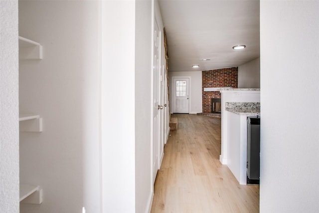 hall featuring light hardwood / wood-style flooring