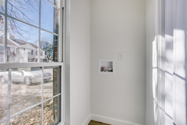 washroom with washer hookup and a wealth of natural light