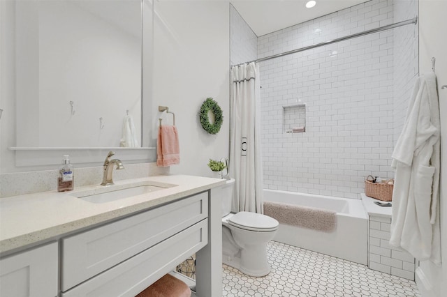 full bathroom with tile patterned flooring, vanity, toilet, and shower / bathtub combination with curtain