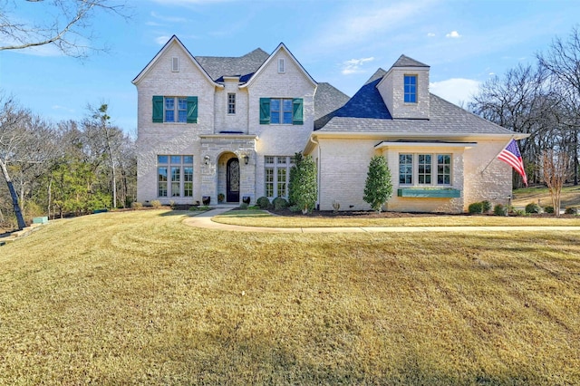 view of front of home with a front lawn