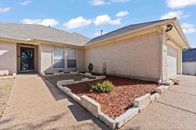 exterior space with a garage