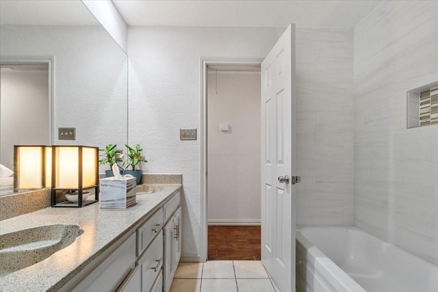 bathroom with vanity and tile patterned floors