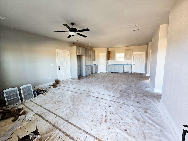 unfurnished living room with ceiling fan