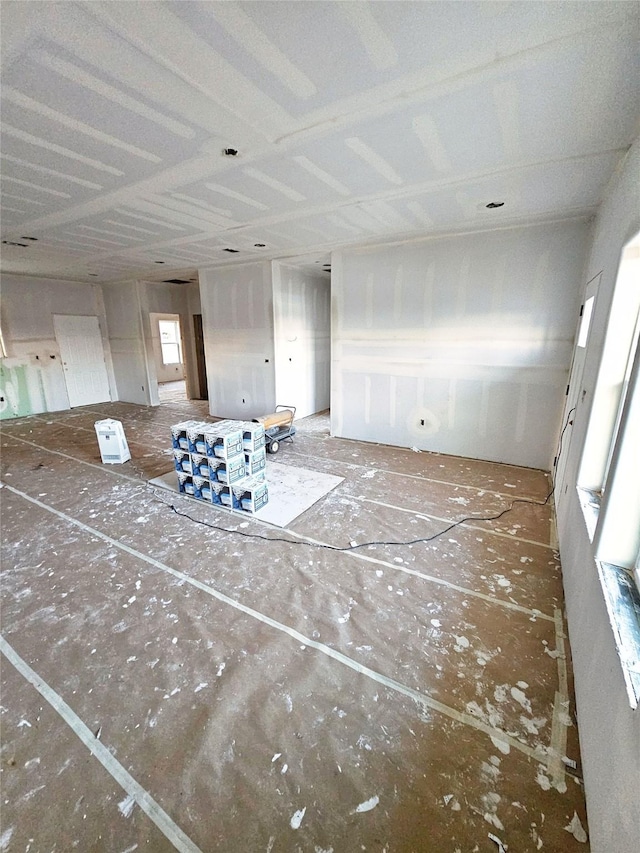 unfurnished living room with plenty of natural light