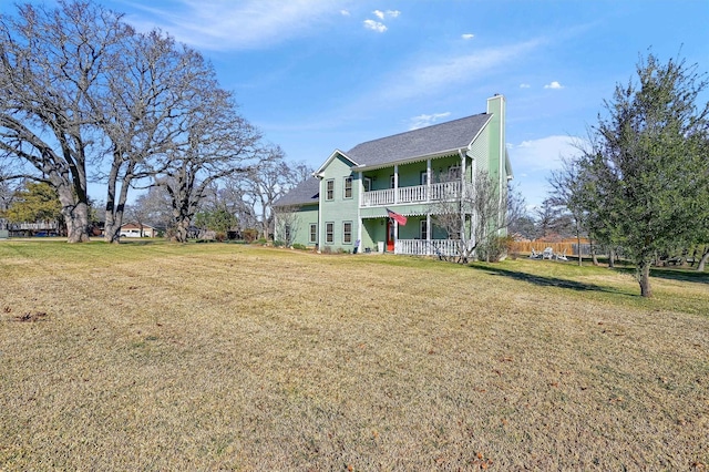 view of front of home with a front lawn and covered porch