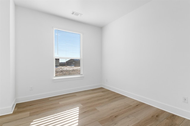 empty room featuring light hardwood / wood-style floors