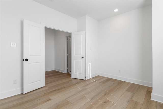 unfurnished bedroom featuring light hardwood / wood-style floors