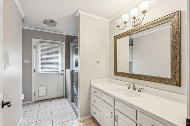 bathroom with vanity, tile patterned floors, crown molding, toilet, and an enclosed shower