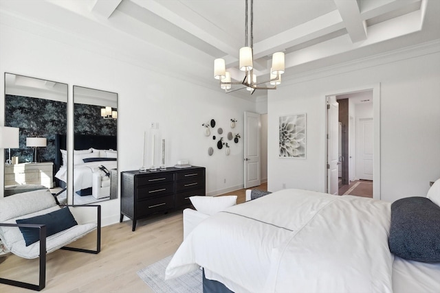 bedroom with coffered ceiling, light wood-type flooring, ornamental molding, beam ceiling, and a chandelier