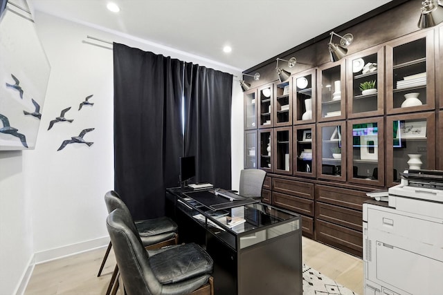 home office featuring light wood-type flooring