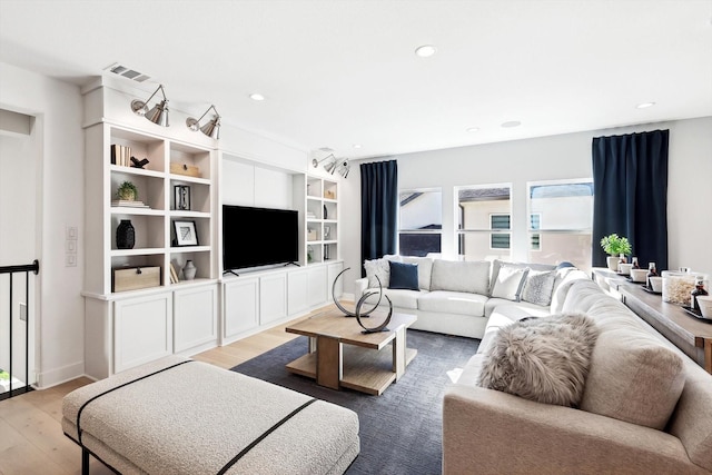 living room with hardwood / wood-style flooring