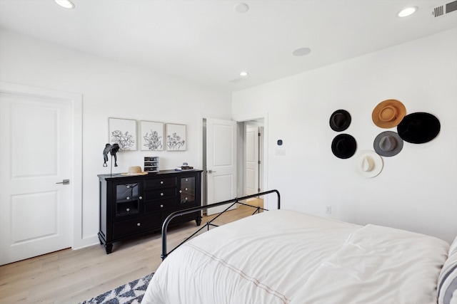 bedroom featuring light hardwood / wood-style floors