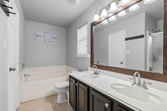 full bathroom featuring plus walk in shower, tile patterned flooring, vanity, and toilet