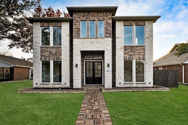 view of front of property with a front lawn