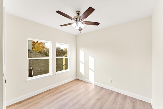 spare room with ceiling fan and light hardwood / wood-style floors