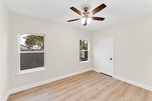 unfurnished room featuring ceiling fan and light hardwood / wood-style floors