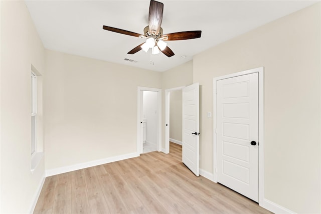 unfurnished bedroom featuring light hardwood / wood-style flooring and ceiling fan