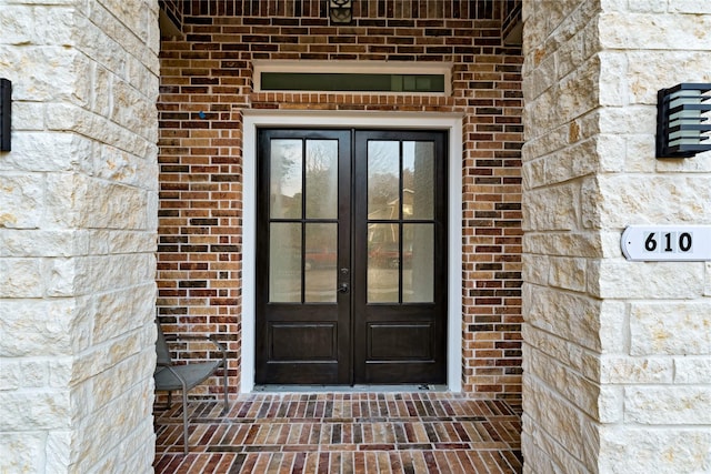 property entrance featuring french doors