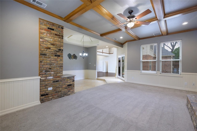 unfurnished living room featuring beam ceiling, light carpet, ceiling fan with notable chandelier, and coffered ceiling