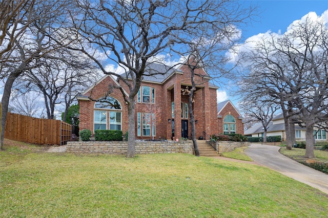 front facade featuring a front lawn