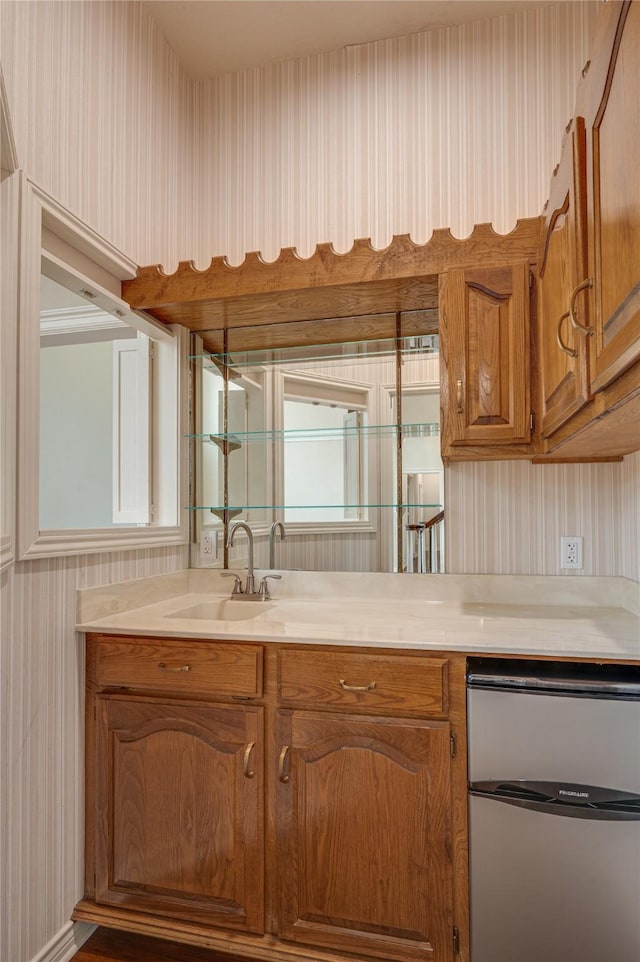 kitchen with stainless steel dishwasher and sink