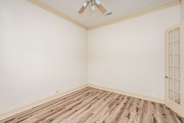 spare room featuring crown molding, ceiling fan, and light hardwood / wood-style floors