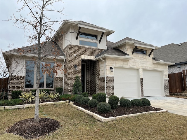 view of front of home with a garage and a front yard