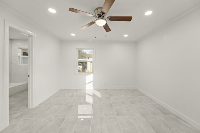 empty room featuring ceiling fan and crown molding