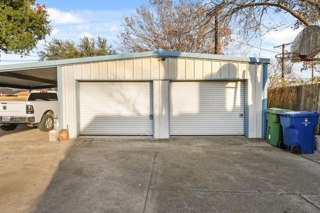 garage featuring a carport