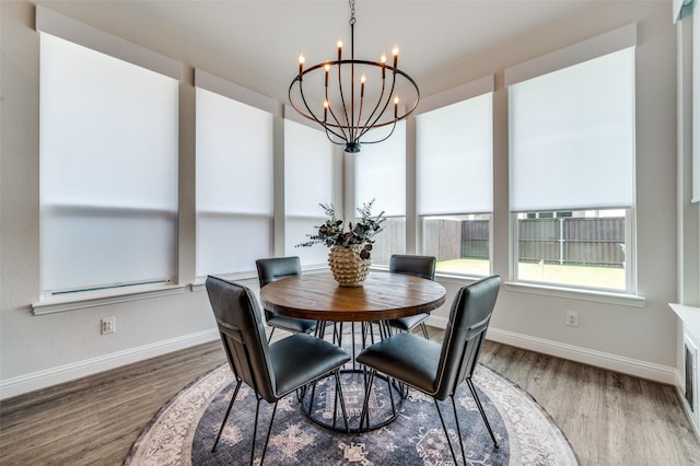 sunroom with a chandelier