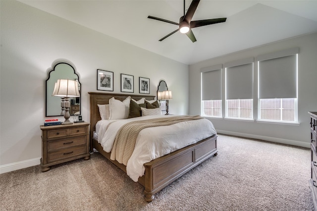 carpeted bedroom featuring ceiling fan and lofted ceiling