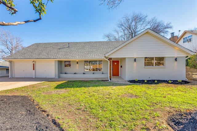 ranch-style home featuring a porch, a garage, and a front lawn