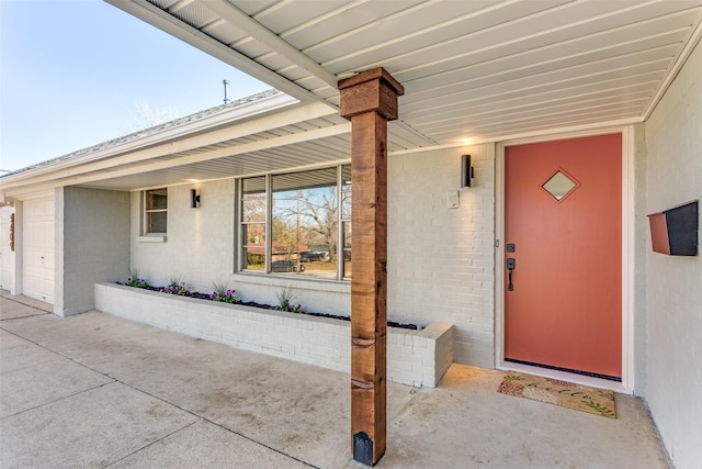 property entrance with a garage