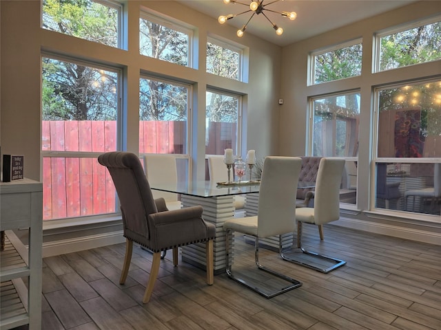 dining room featuring a chandelier and a wealth of natural light