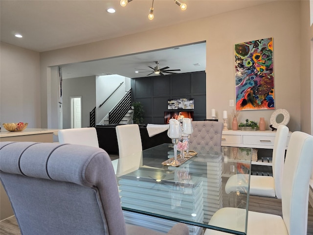 dining space with ceiling fan