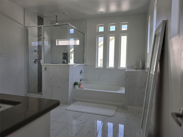 bathroom with independent shower and bath