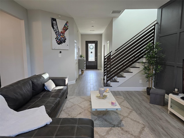 living room with hardwood / wood-style flooring