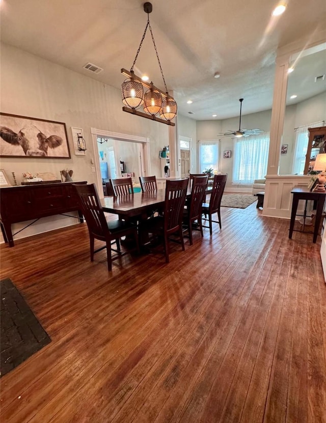 dining space featuring hardwood / wood-style flooring and ceiling fan