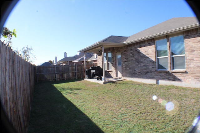 view of yard with a patio area