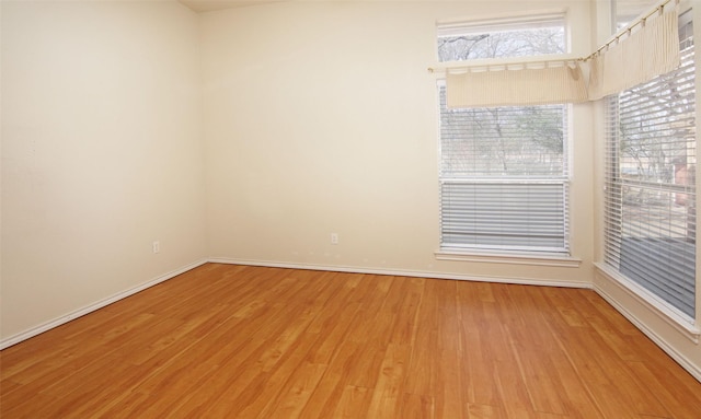 empty room featuring hardwood / wood-style floors