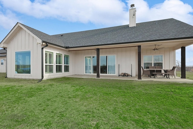 back of property featuring a yard, ceiling fan, and a patio area